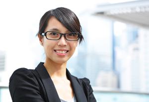 woman with black hair and glasses