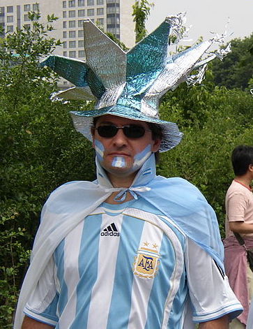 A man dressed like an Argentine flag