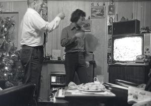 two men watching TV