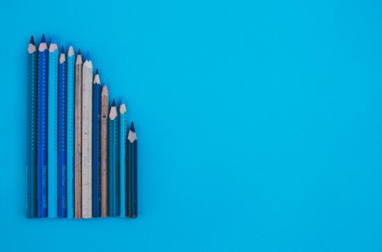 A lineup of pencils of varying lengths.