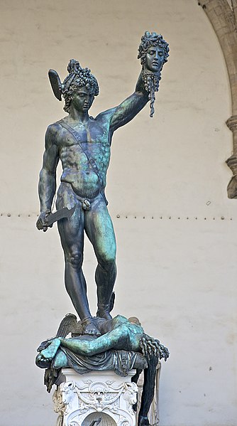 Perseus is holding the head of Medusa that he just cut off