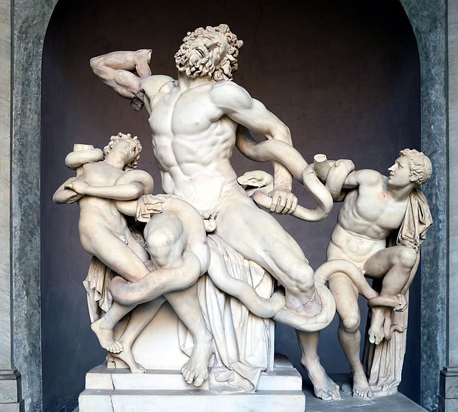 Laocoon and His Sons white marble statue with a snake wrapping around them. 