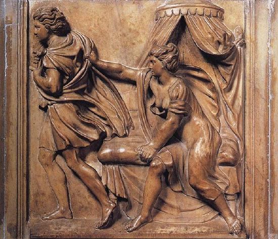 Joseph and wife carved marble plaque