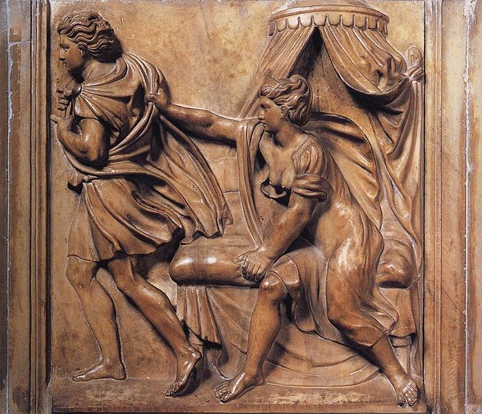 Joseph and wife carved marble plaque