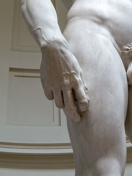 Close up of marble statue showing the details of the hand