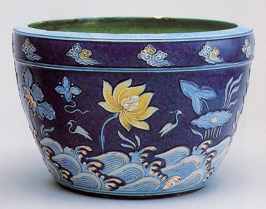 Basin with a lotus pond decoration in white, blue, and yellow