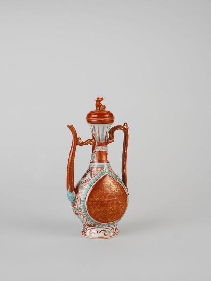 Porcelain teapot with red and green decorations 