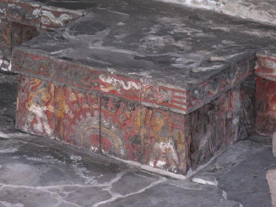 The banquet of warrior depicted in stone and color on a step