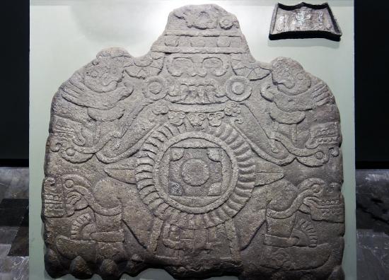 The earthlord stone carving with Aztec symbols