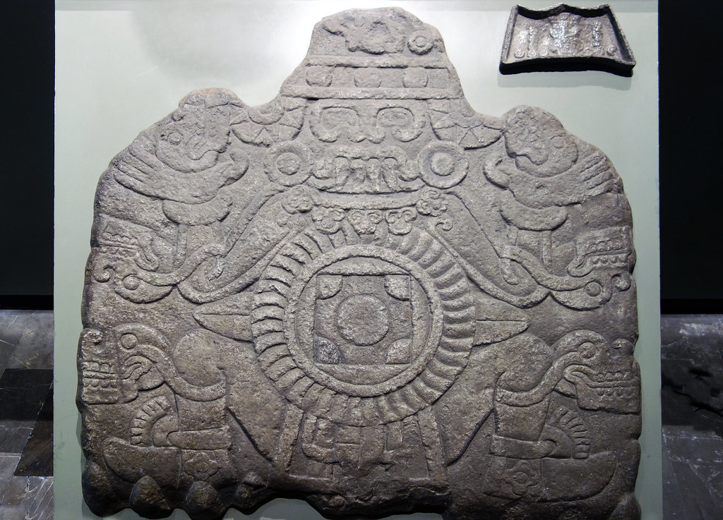 The earthlord stone carving with Aztec symbols