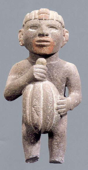 Cacao Aztec Sculpture carved from stone of a man holding a cacao pod
