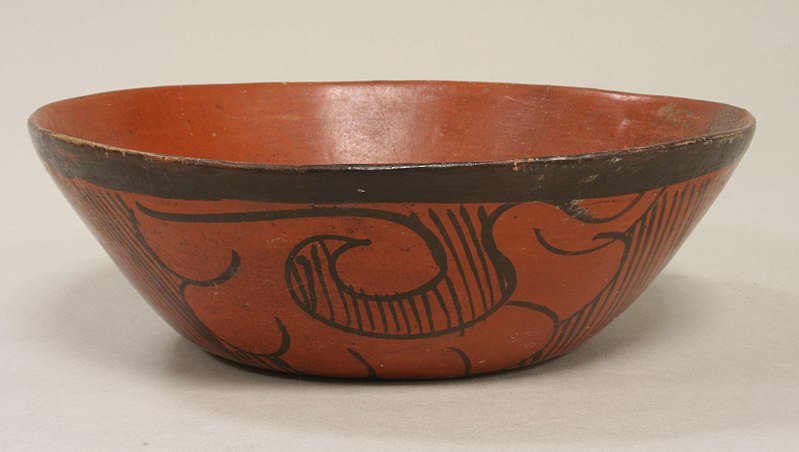 Orange bowl with black symbols