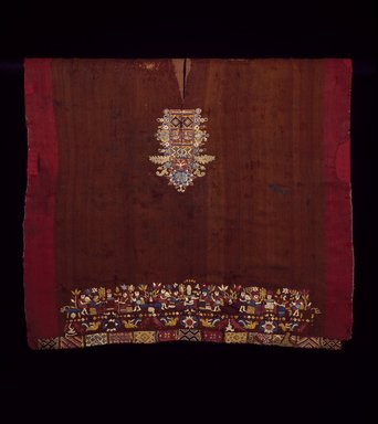 tunic woven with Spanish symbols