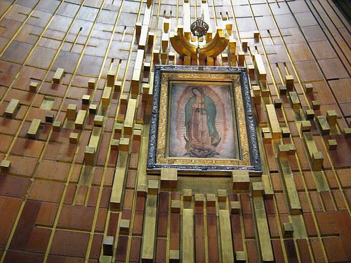 painting of the virgin of Guadalupe on a brick wall