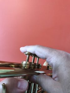 Trumpet played with flat finger