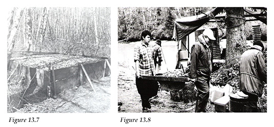 Oolichan pit; Arthur Dick Sr. and Jr. carrying a tub of dzaxwan