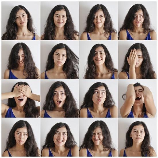 A collage of 16 portraits of a young woman expressing a variety of emotions.