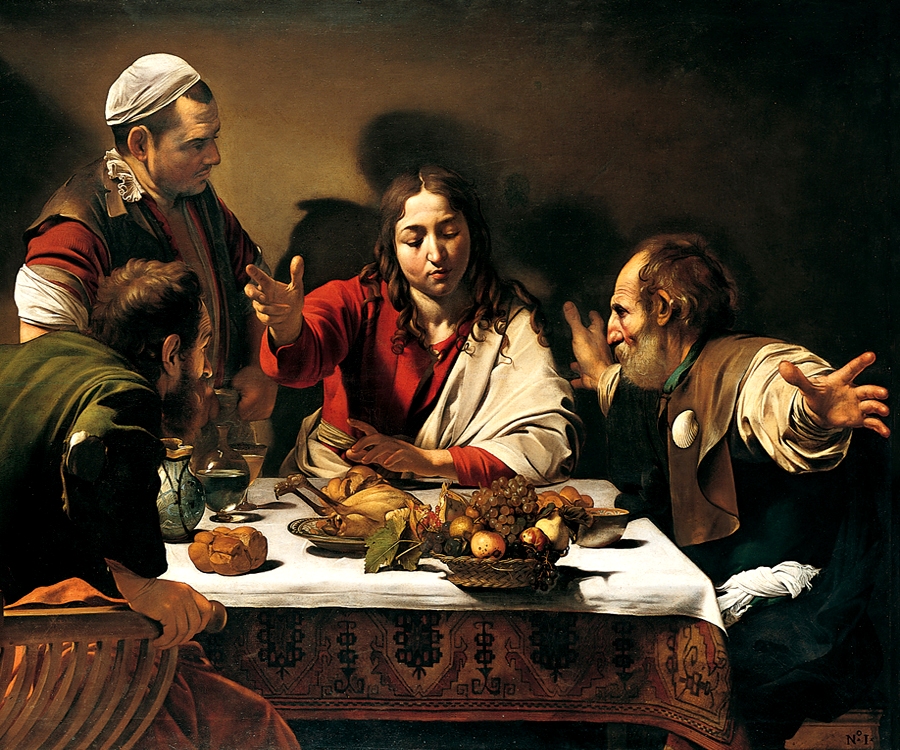 Four men sitting around the dinner table
