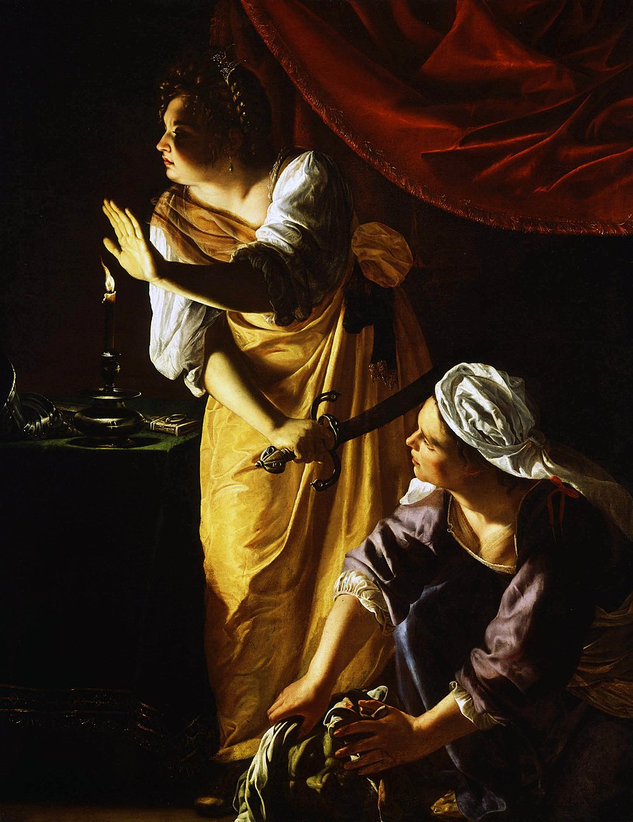 Two women inside a dark room with red drapes with a large knife