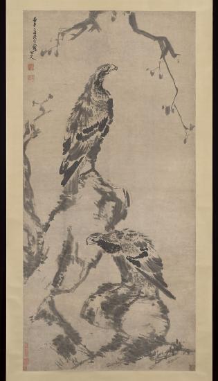Two birds on branches