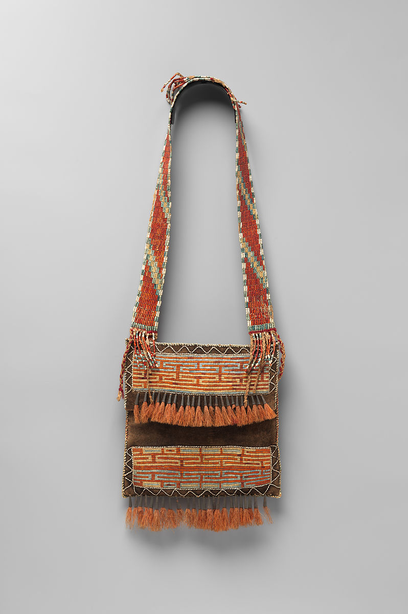 A beaded bag and shoulder strap in different colors made from natural materials