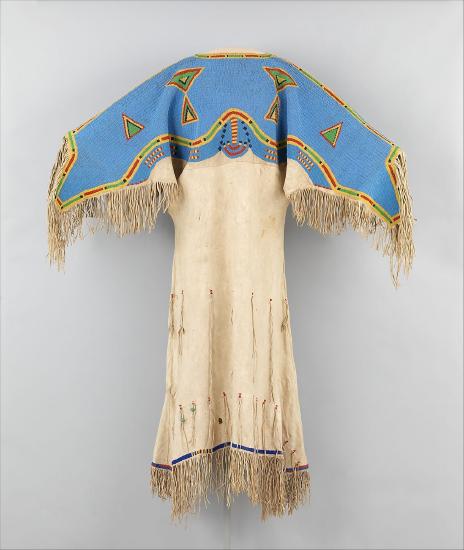 Dress made from tanned leather and blue glass beads woven at the top into designs