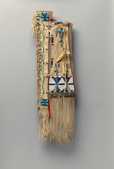 A tobacco bag and pipe holder made from leather and beaded in many colors