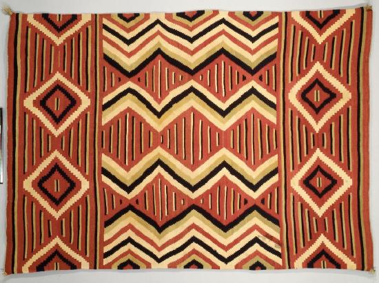 Navajo warring blanket with triangles and stripes woven in bright colors