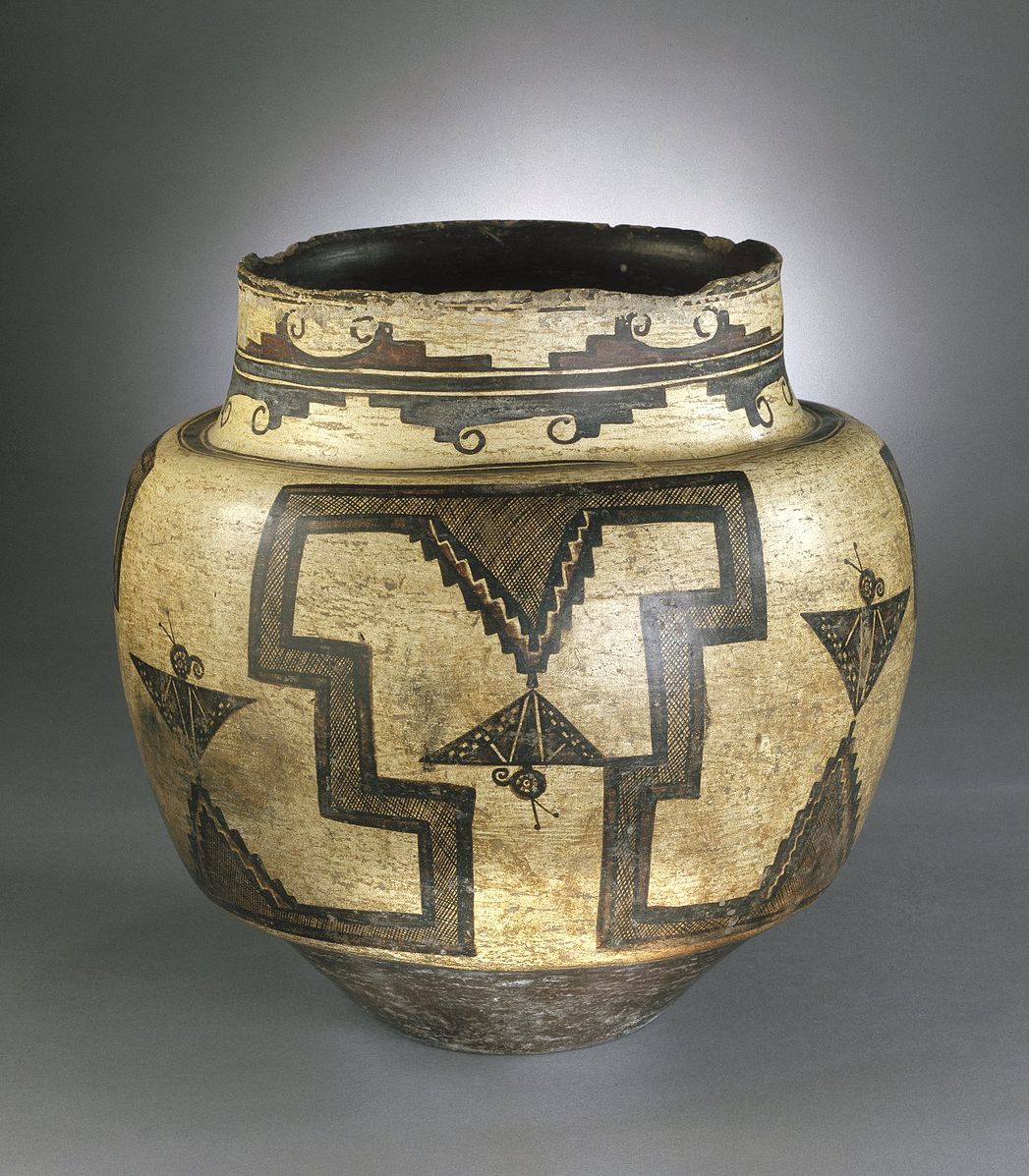 A water pot made of clay and painted with pigments in geometric designs