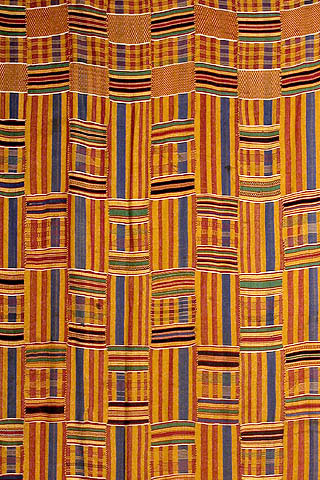 kente cloth woven in multiple interwoven stripes of multiple colors