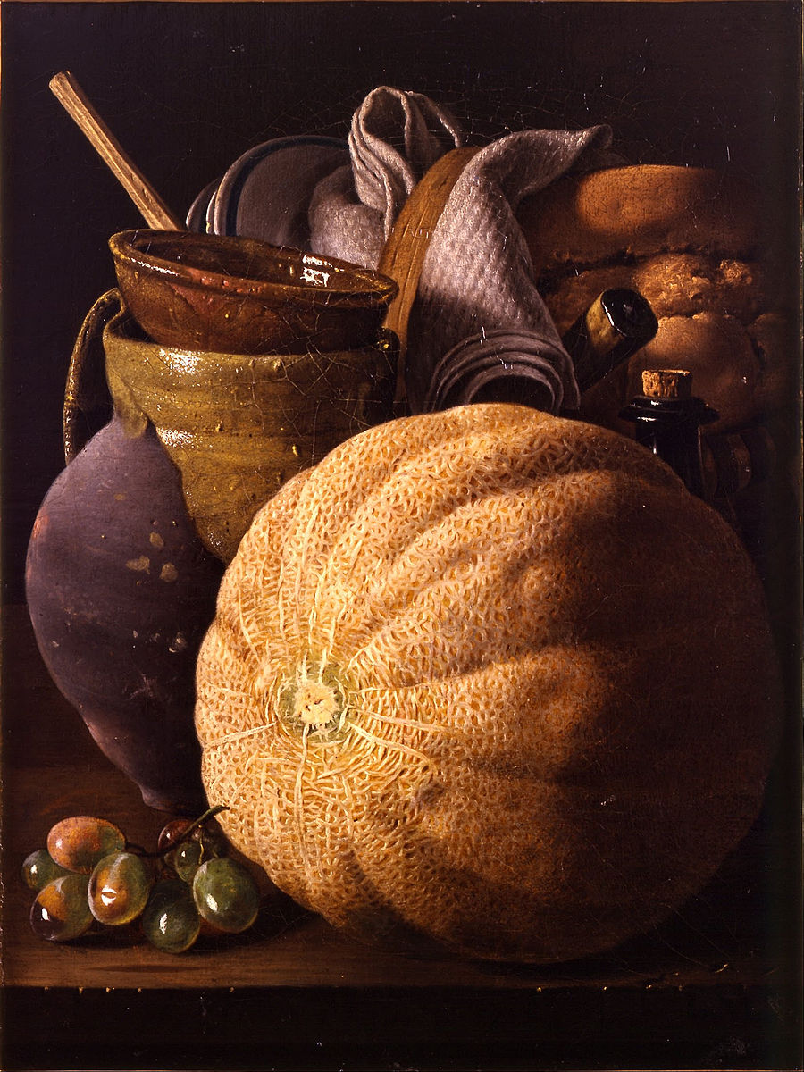 Still life with pumpkin, spoon, grapes, cups, wine and bread