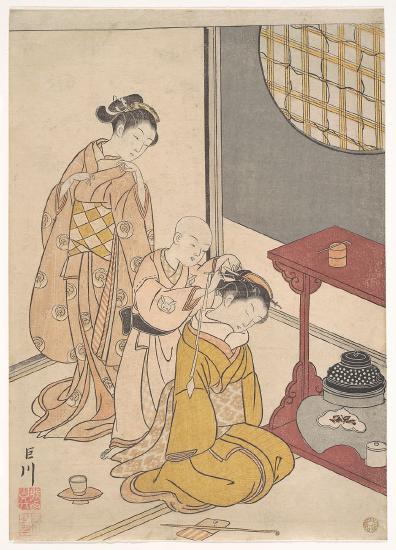 Three people in a room doing one of the womans hair