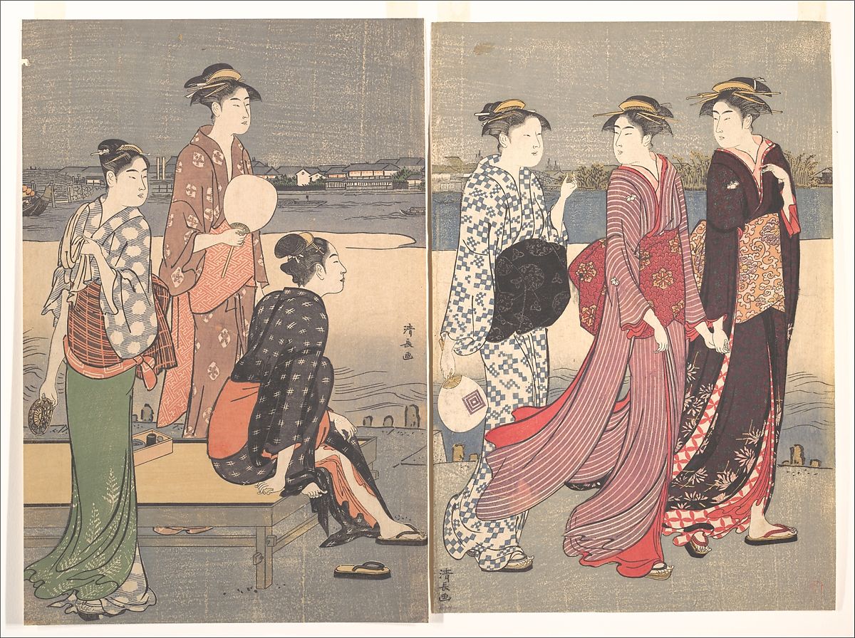 Seis mujeres en un malecón de playa, tres están sentadas y tres caminan