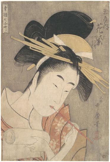 A woman putting on her make up