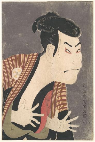 A person in a striped robe with their hands out in front of them