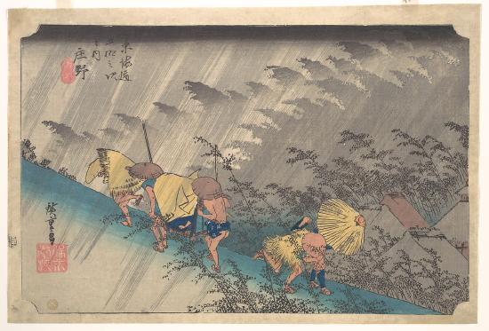 Five people walking in a rainstorm with umbrellas