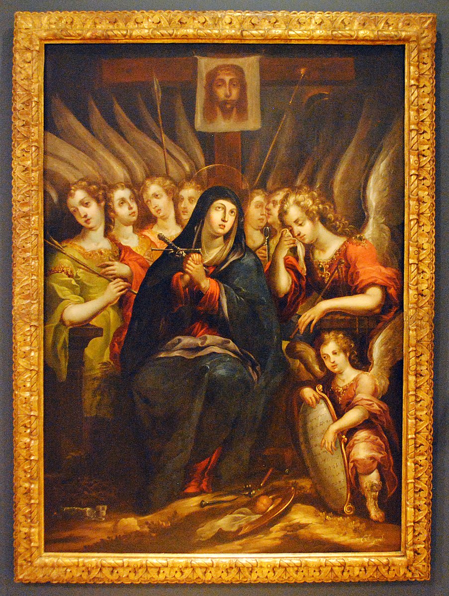 A woman in a blue robe surrounded by other women with wings