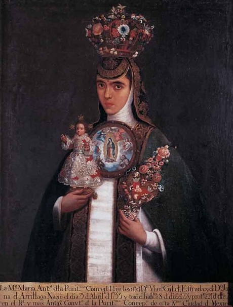 A woman with a crown holding a doll and flowers