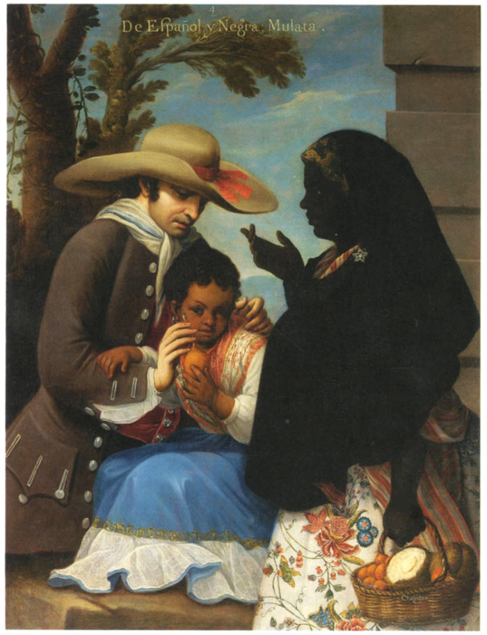 A man, woman, and small child outside