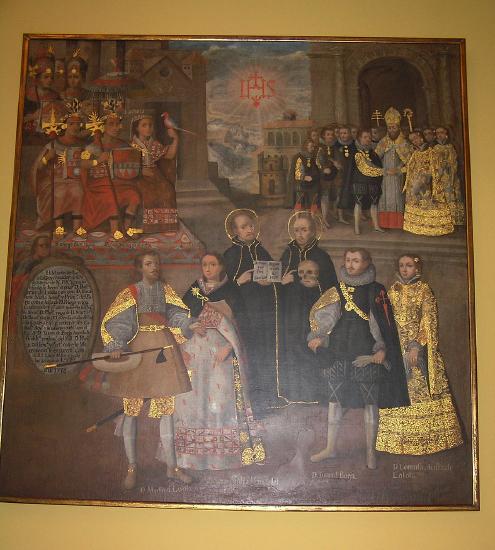 A religious setting with several people and painted with gold