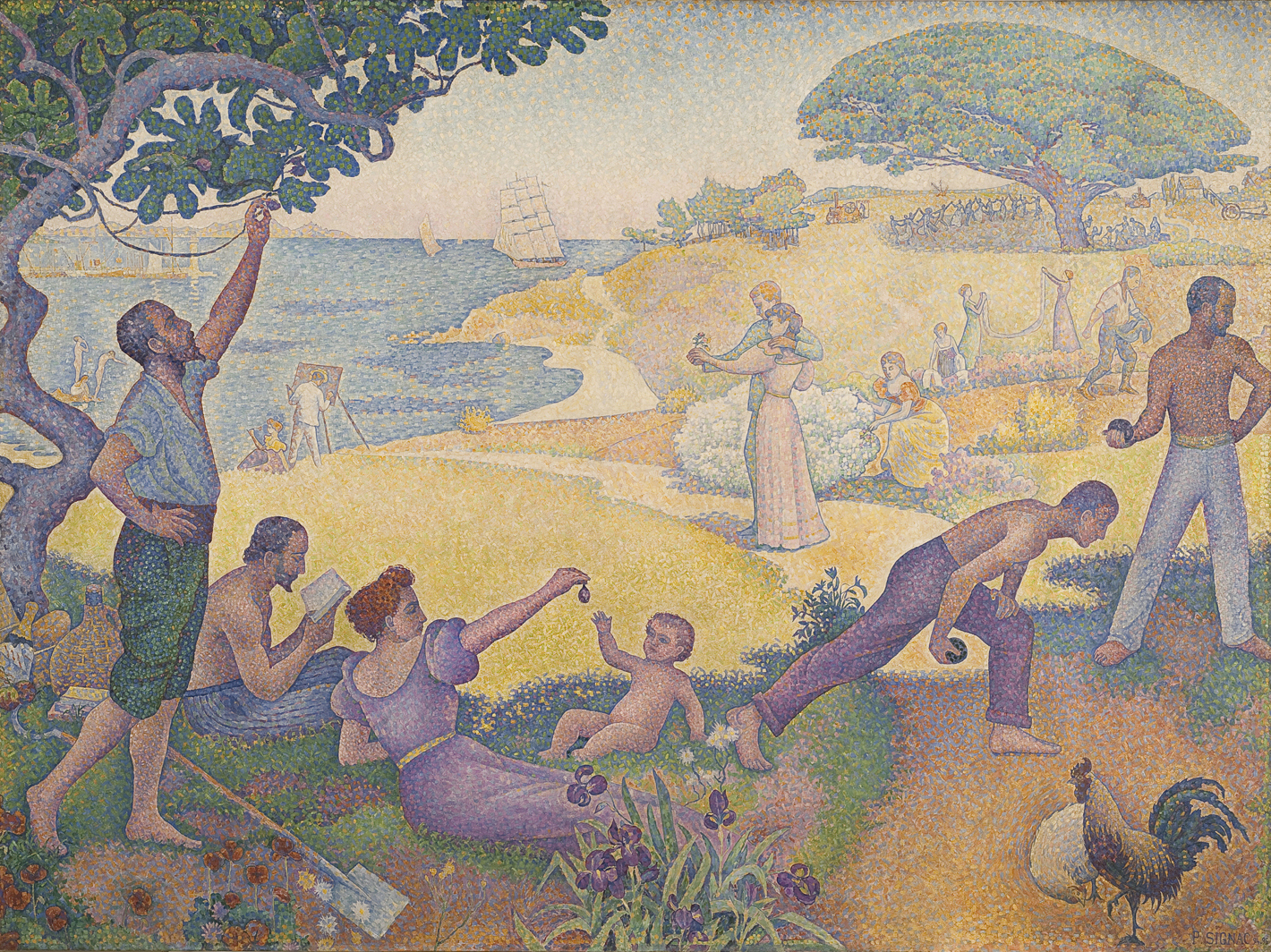 Several people lounging on grass over looking a lake eating food.