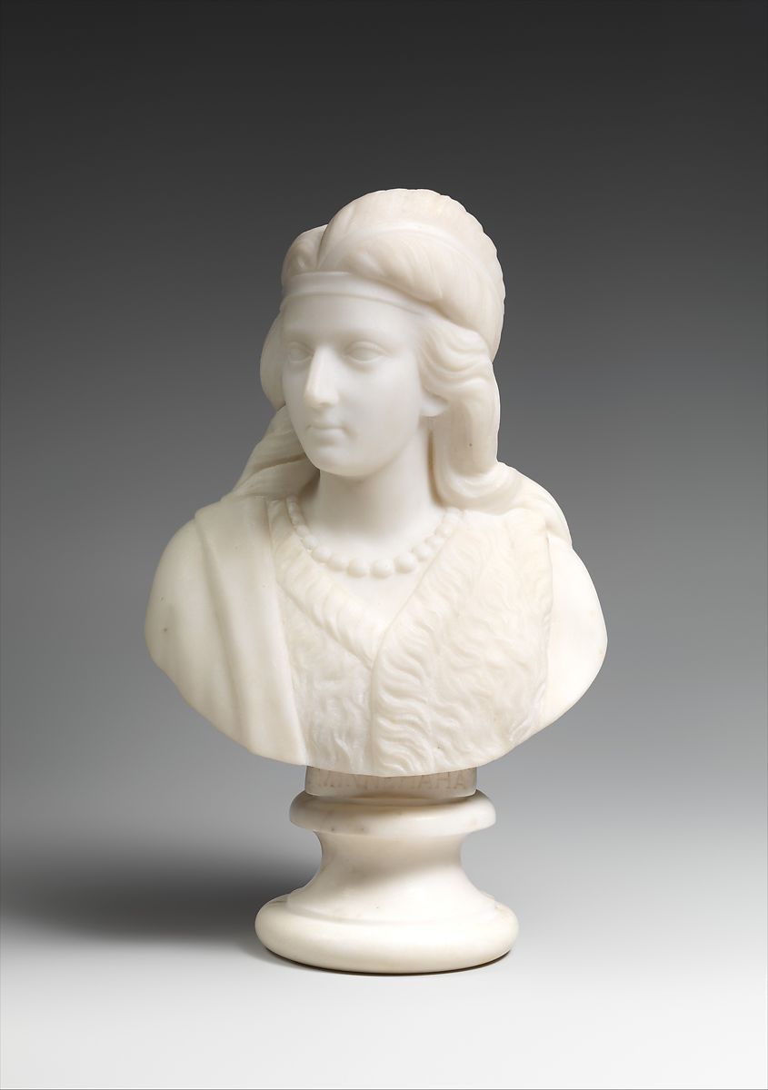 A marble bust of a young woman 