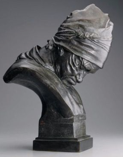 A bronze bust of an older woman with her head resting on her chest