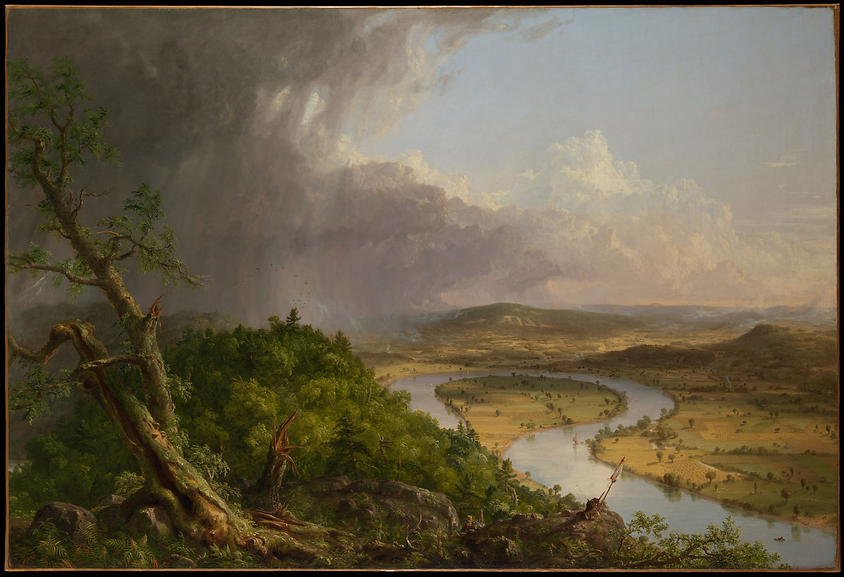 a landscape of a river and mountains with an approaching storm