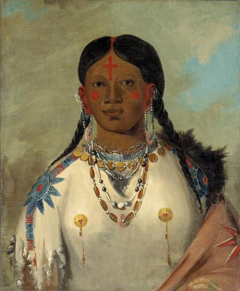 A woman with long hair and traditional native clothing