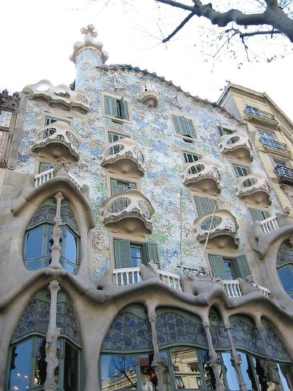 Facade of apartment building with stained glass and balconies
