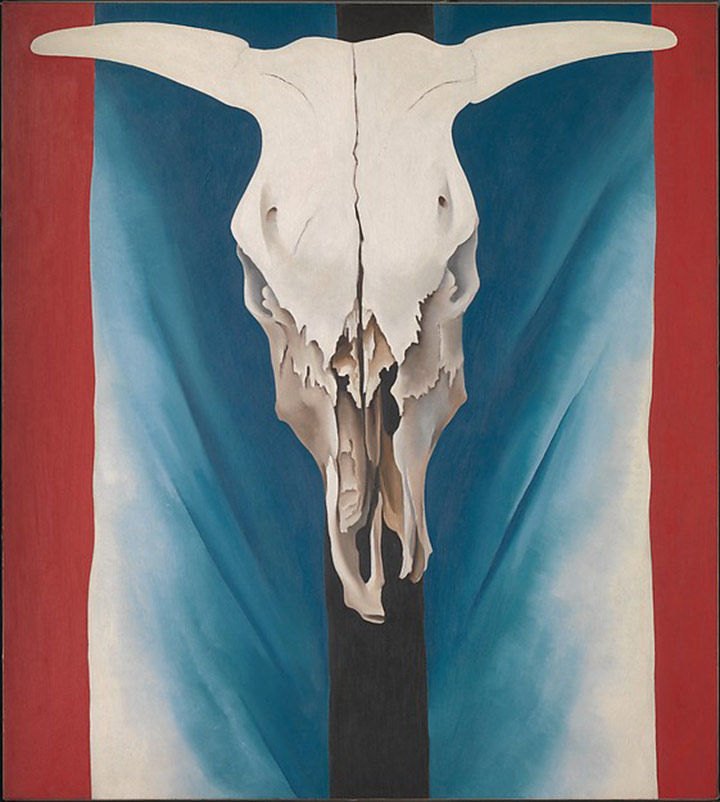 A cow skull against a red white and blue background
