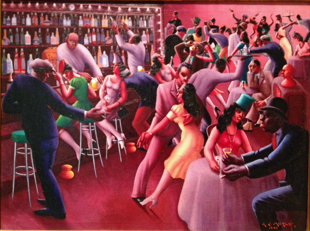 A bar scene with many people in colorful dress drinking and dancing