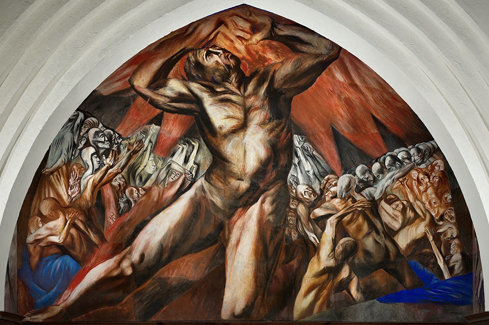 A nude man in the center and several people in the background