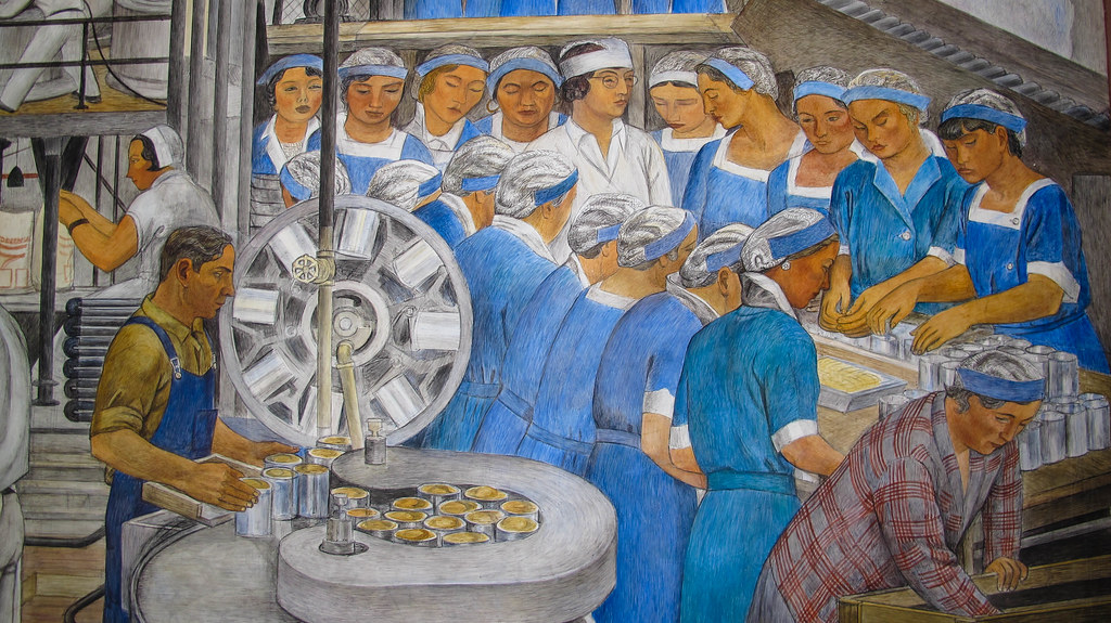 Closeup of the women canning fruit